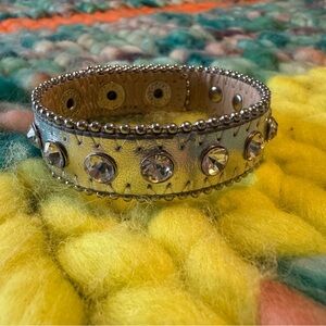 Studded wrap bracelet silver metallic adjustable sizing. EUC